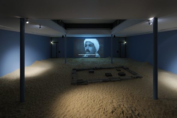 Wael Shawky – “Al Araba Al Madfuna” (2012), Video, B&W, 21 min, KW Institute for Contemporary Art 2012, Installation view; photo by Uwe Walter