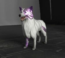 A photograph of a sculpture of a white dog with a metallic purple face and metallic purple stripes.