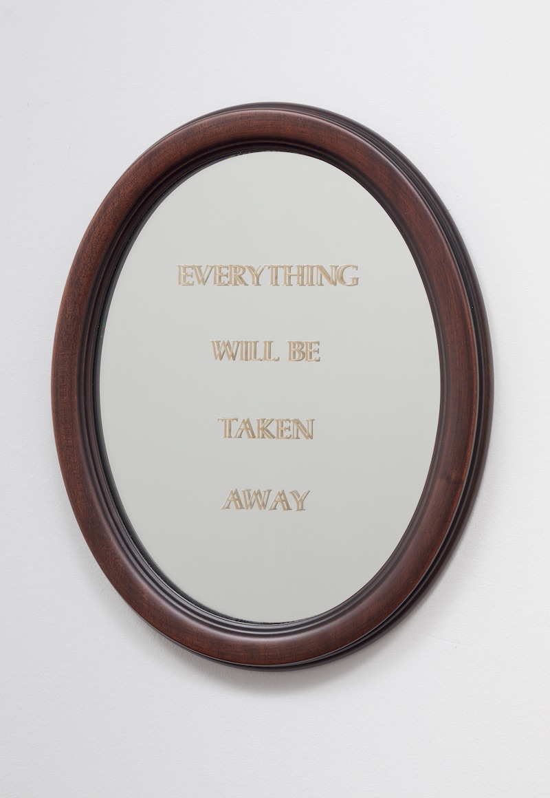 an oval frame with an embroidered text inside reading "everything will be taken away"