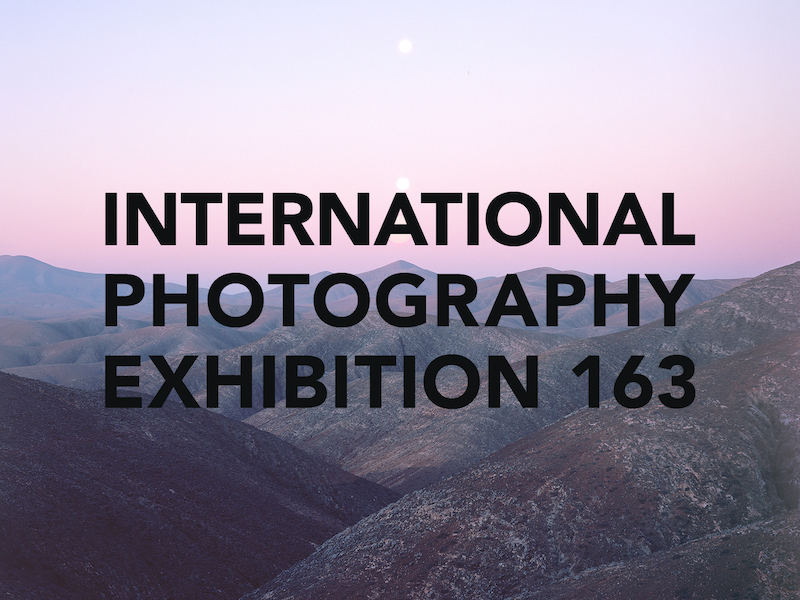 Reads "International Photography Exhibition 163"