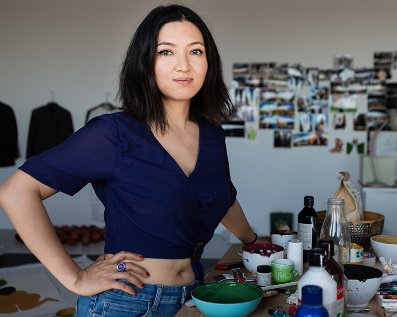 portrait of a female artist in her studio