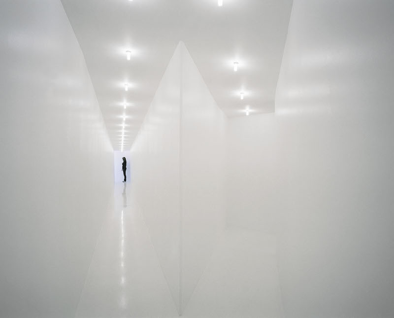 corridor installation with bright white walls, floor and ceiling