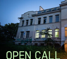 photo for an open call in lithuania, pictured is a villa at twilight with the words open call printed on top