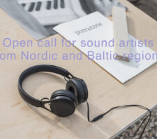 poster for an open call with image of black headphones on a wooden table and purple text layover