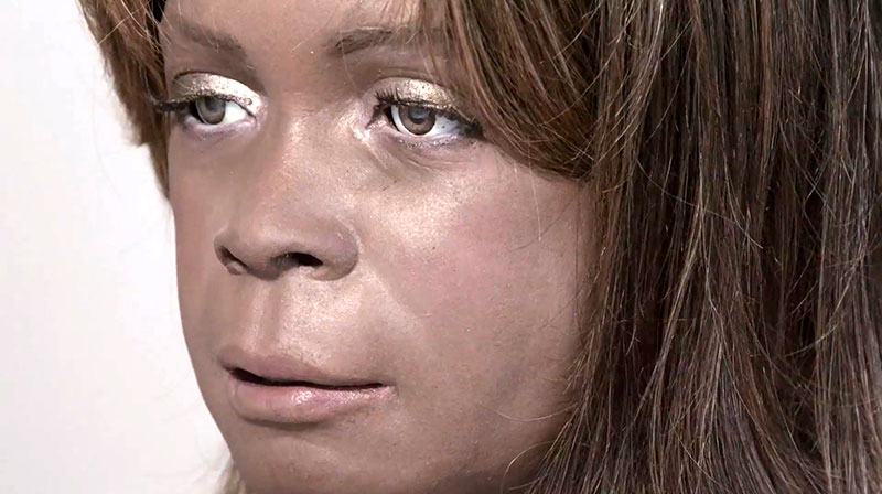 extreme close-up of a female-like robot's face